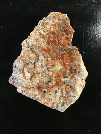 Spessartine Garnet in Quartz Matrix