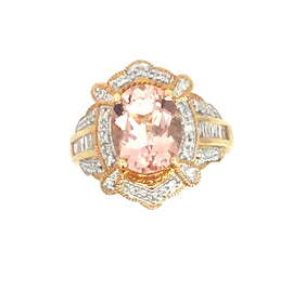 Oval Morganite with diamonds in yellow gold ring