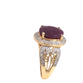 Purplish Red oval cut Ruby and diamond ring