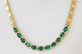 18 karat yellow gold necklace with emeralds and diamonds