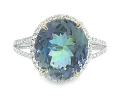 Natural grayish violetish blue oval Tanzanite and diamond in 14K white gold Ring