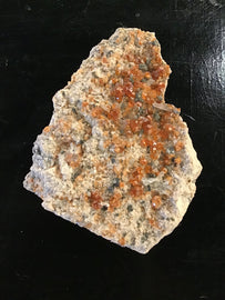 Spessartine Garnet in Quartz Matrix