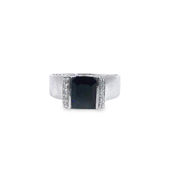 Dark blue corundum sapphire with emerald cut ring