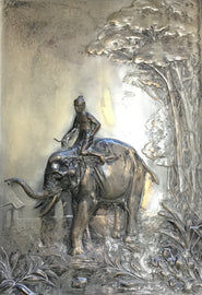 Silvered bronze relief plaque man on Elephant