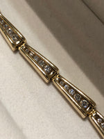 14kt yellow gold and diamond bracelet