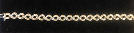 14K yellow gold interlocking pear shaped link bracelet w/ tapered melee 3450 diamonds